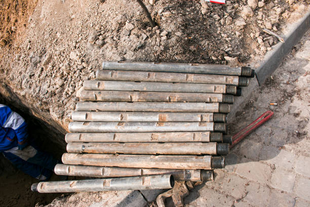 istock Machine for installing sewerage. Rod fittings for sewer laying mechanism. 1307922503