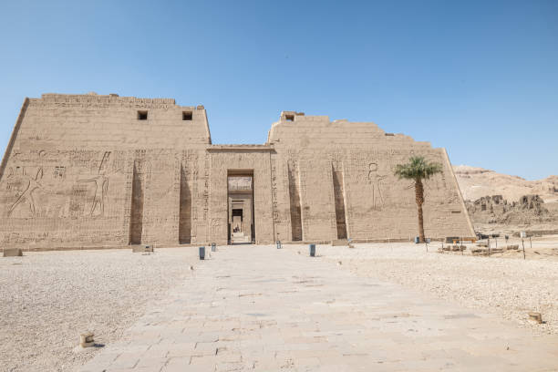 The entrance Medinet Habu temple, Luxor Daytime, sunlight. Luxor West bank, Egypt medinet habu stock pictures, royalty-free photos & images