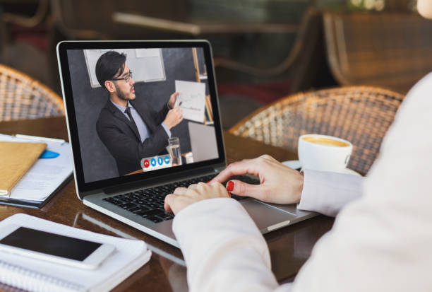 istock Remote Communication. Unrecognizable Lady Having Web Conference On Laptop With Business Partner 1307928020
