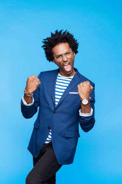 istock Excited man enjoying success 1307929084