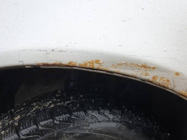 istock rust on the car body, metal corrosion. 1307930728
