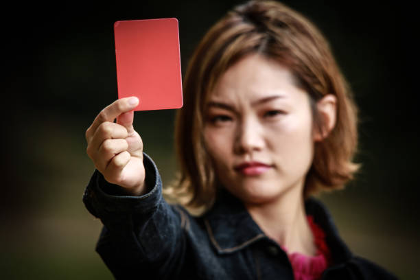 istock Woman issuing a red card 1307932131