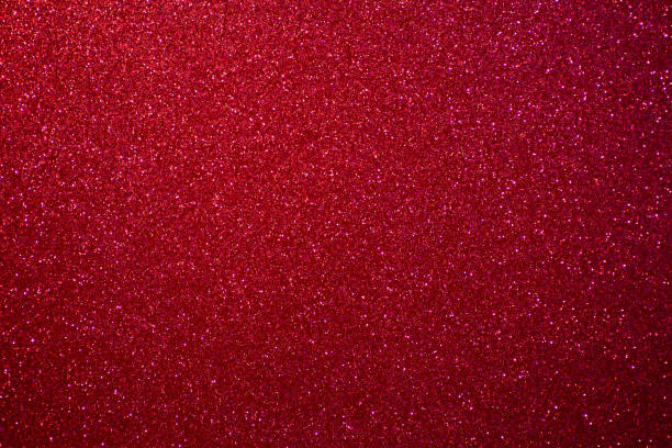 istock Glitter pink background.  Red and pink background with sparkling festive glitter 1307932787