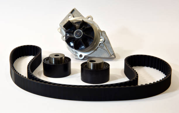 istock The timing belt, rollers and water pump stands on a white background 1307941847
