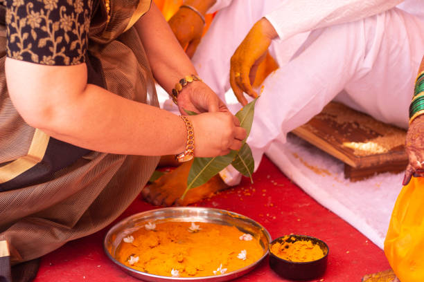 Marathi haldi ceremony Marathi haldi ritual in indian wedding ceremony haldi ceremony stock pictures, royalty-free photos & images