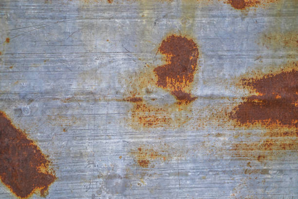istock Background from rusty metal close-up. Rust spots on iron. 1307945467