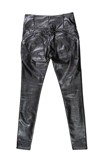 istock Black leather female pants back view isolated, leather leggings 1307956177