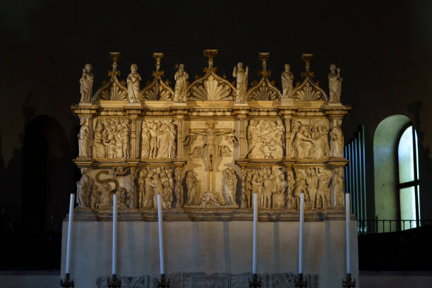 Milan, Italy - July 16, 2020: Sant Eustorgio, Paleochristian church in Romanesque style in Milan, Lombardy, Italy. Sculpture in the interior