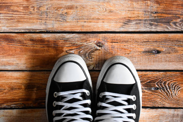 istock Shoes on a wooden floor 1307961185