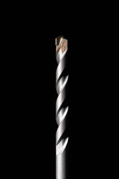 istock Widia drill bit for concrete and walls with black background and vertical frame 1307961451