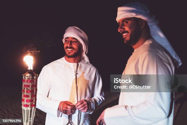 Arabs Meeting At The Desert Camp Stock Photo - Download Image Now - Ramadan, People, Arab Culture