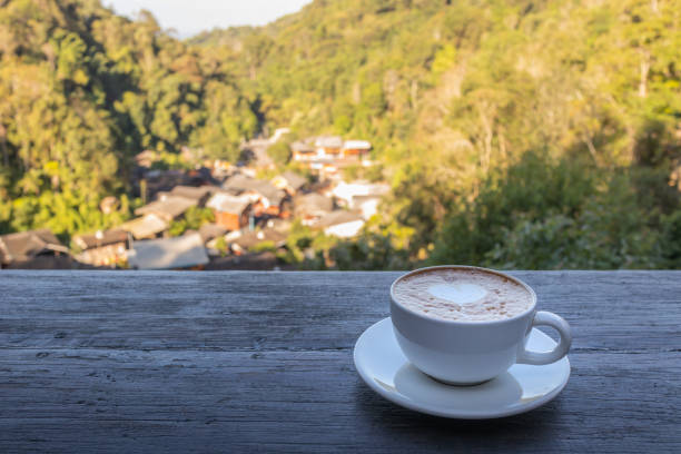 istock A cup of coffee with mountain view. 1307966649