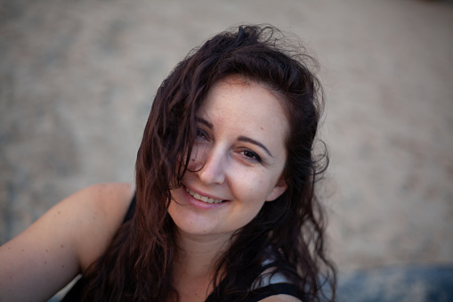 https://media.istockphoto.com/id/1307967433/photo/beautiful-brown-haired-woman-in-black-t-shirt-on-blurred-background.jpg?b=1&s=170667a&w=0&k=20&c=F6xxYVsjldlyZjuiC3uHWRsLPbBQPvwrQHlIc9MFiJY=