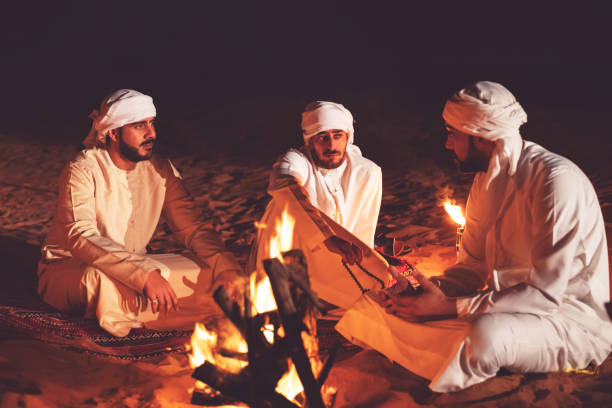 istock Arabs camping at a desert safari camp 1307969018