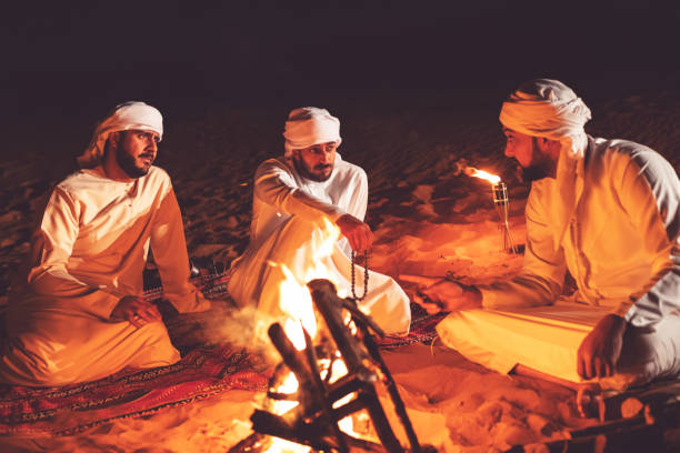 istock Arabs camping at a desert safari camp 1307974197