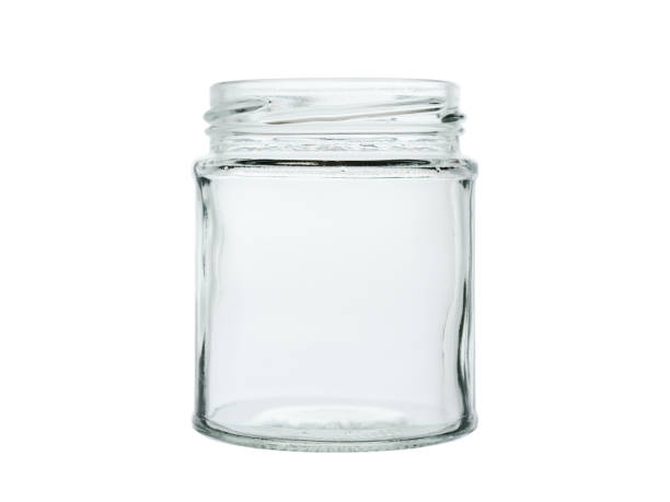 istock Empty, open tin can made of clear, colorless glass. Isolated on a white background, front view 1307977154