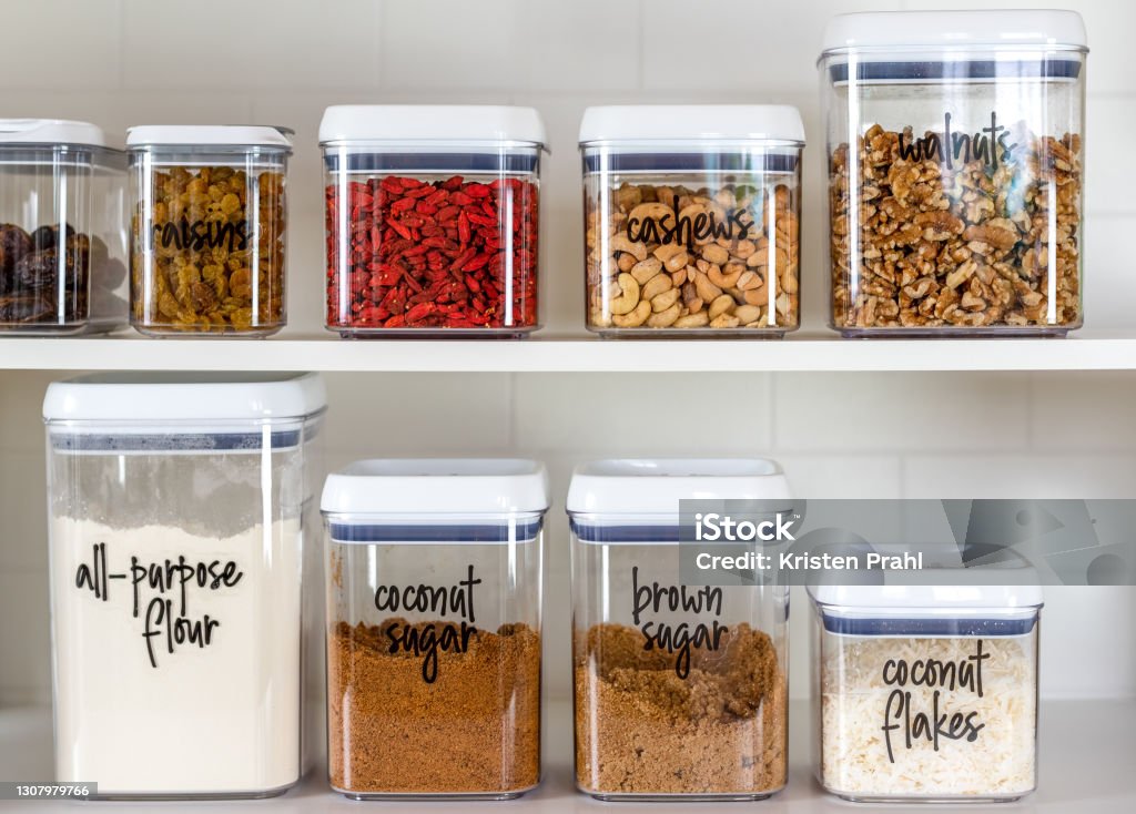 Neatly Organized Transparent Canisters For Baking Ingredients Stock Photo -  Download Image Now - iStock