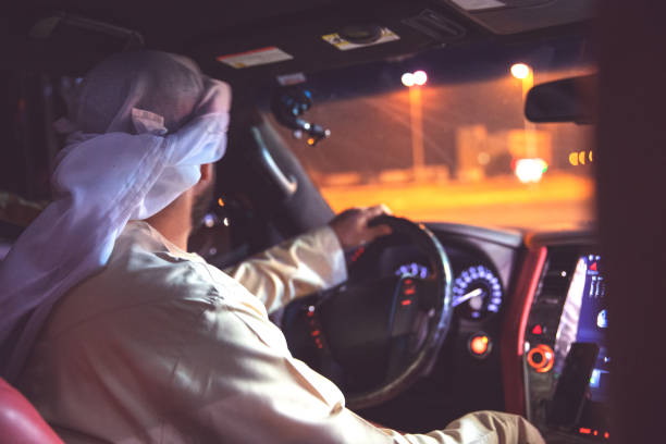 istock Arab driving his luxury SUV on the freeway 1307980269