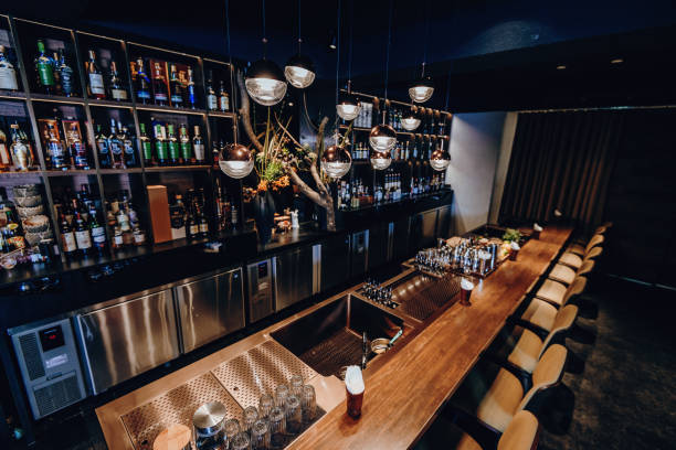istock Modern empty night bar, wide angle shot of cafe during coronavirus lockdown 1307980867