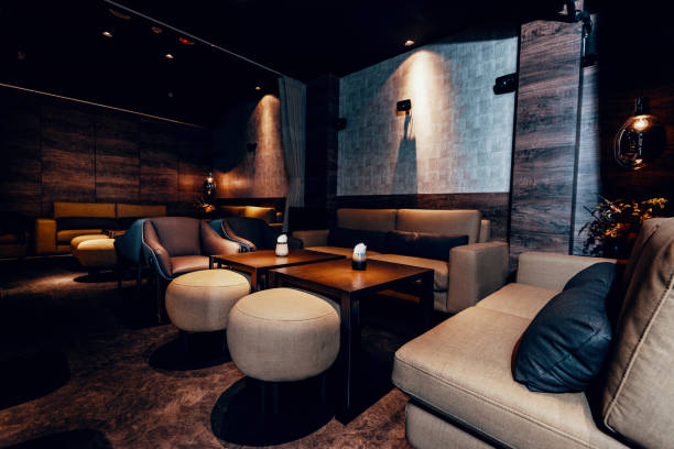 istock Modern empty night bar, wide angle shot of cafe during coronavirus lockdown 1307980980
