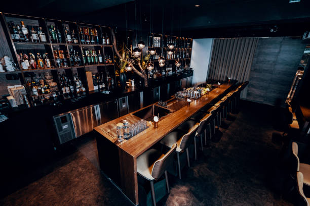 istock Modern empty night bar, wide angle shot of cafe during coronavirus lockdown 1307980983