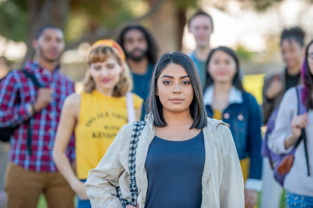 istock Female University Student Standing Outdoors on Campus 1307981632