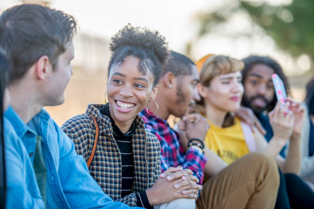 istock Diverse Group of University Students Hanging Out Together 1307981645