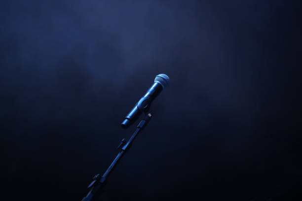 concert microphone on dark blue smoke background