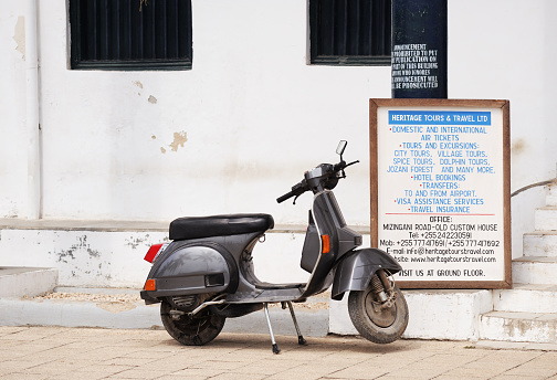 ZANZIBAR - TANZANIA,CITY TOWN, AUGUST 17, 2019:This is a scooter Vespa LML Star 200 in the parking on the city street.