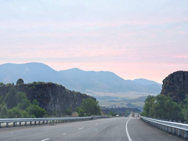 istock Road side scenery with distant mountains in Idaho, USA. 1307988396