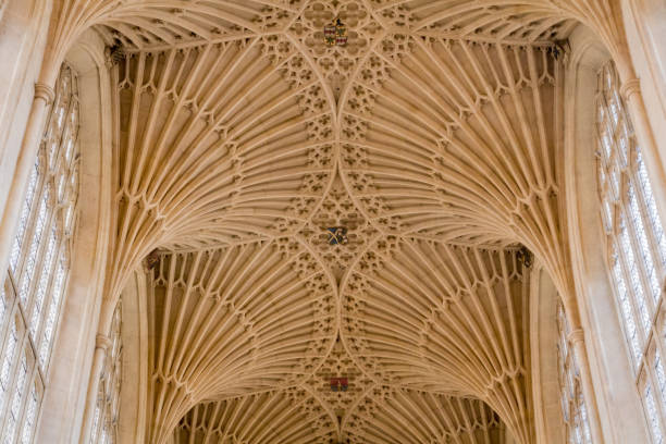 Stone Vault inside Bath Abbey Detail of the gothic stone vault at Bath Abbey on a sunny day bath abbey stock pictures, royalty-free photos & images