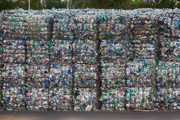 crushed plastic bottles - recycling stock photo