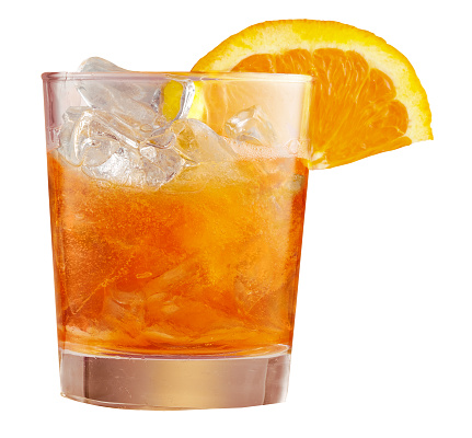 Glass of ice cold Spritz cocktail served in glass, decorated with slices of orange. Aperitif, isolated on white