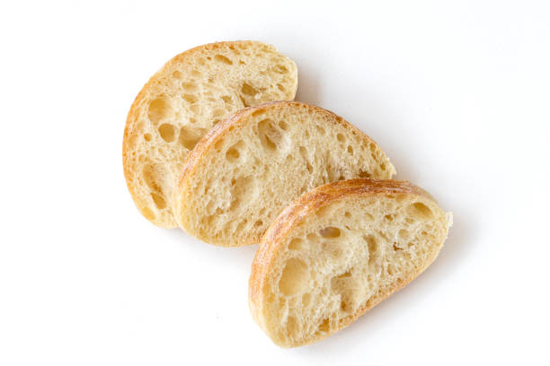 istock Slice of ciabatta bread isolated on white background, top view. 1307993986