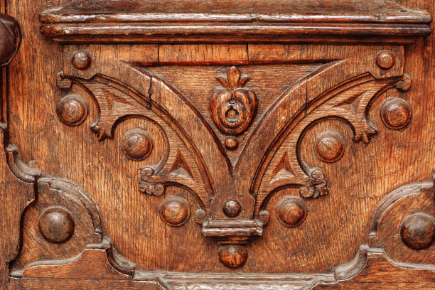 istock old wooden texture with pattern. seamless wooden panel door texture with nails 1307995438