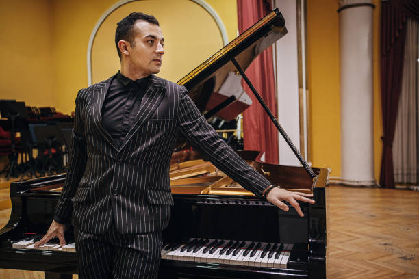 istock Handsome male pianist 1307997123