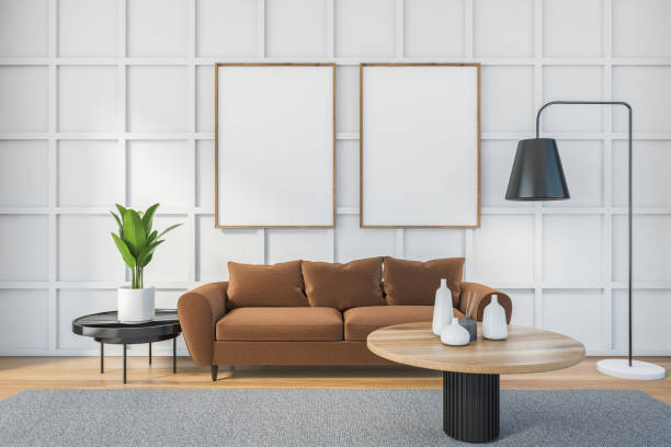 istock Mockup canvas in white living room with brown sofa and table on carpet 1307997124