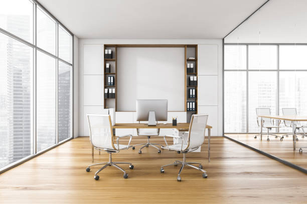 istock White office room with chairs, table and computer, parquet floor with shelf 1307997388