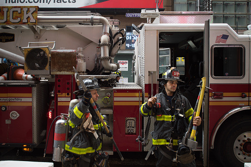 Manhattan, New York, March 17, 2021. Firefighters getting ready for an intervention in Midtown.