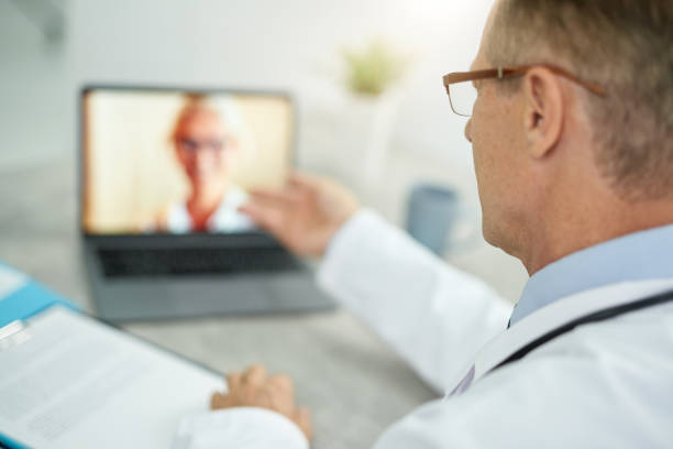 istock Doctor using laptop for online consultation in clinic 1308004265