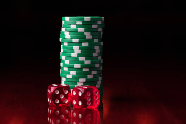 istock Group of gambling chips and red dice 1308011349