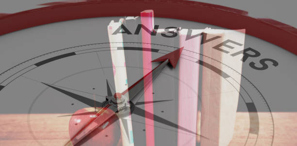istock Composite image of compass pointing to answers 1308018006