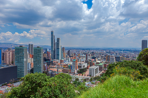 Bogotá, Colombia - Looking at a high angle view of BD Bacatá from a higher altitude on the Andes Mountains. The BD Bacatá with 67 floors on the South Tower, is the tallest building in Colombia and the 6th tallest in South America. The actual altitude of the Bogota, Colombia's capital city, at street level is about 8,500 feet above mean sea level. It is one of the largest cities of South America with a population of almost 10 million people. Image shot on a clear morning on the Andes Mountains.