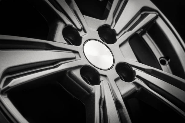 istock new grey aluminum alloy wheel die cast disc close up 1308024299