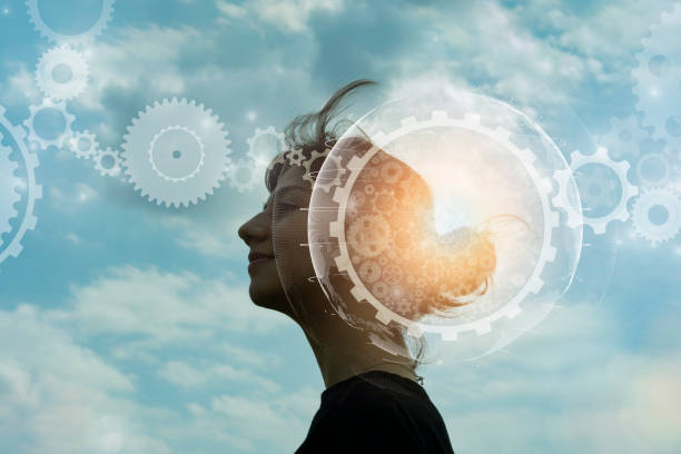 istock a woman's profile photo and gear 1308025293