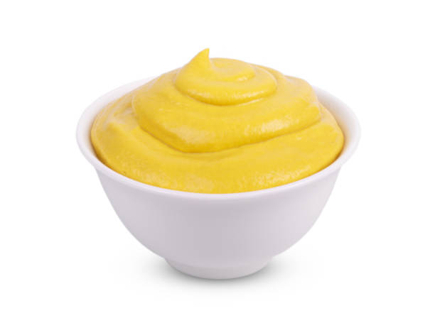 istock Mustard tasty sauce in bowl isolated on white background. 1308045584