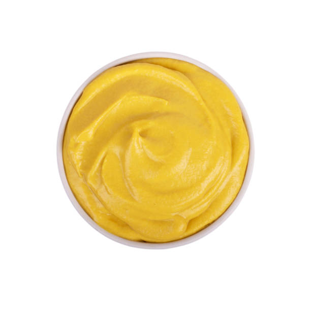 istock Mustard sauce in ceramic white bowl isolated on white background. 1308045604