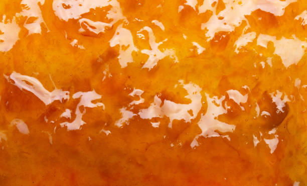 delicioso laranja saboroso fundo textura geleia de perto - marmelada - fotografias e filmes do acervo