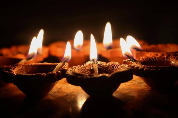 istock View of clay Diya's (Indian clay oil lamp) 1308047438