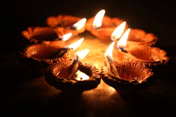 istock View of clay Diya's (Indian clay oil lamp) 1308047440
